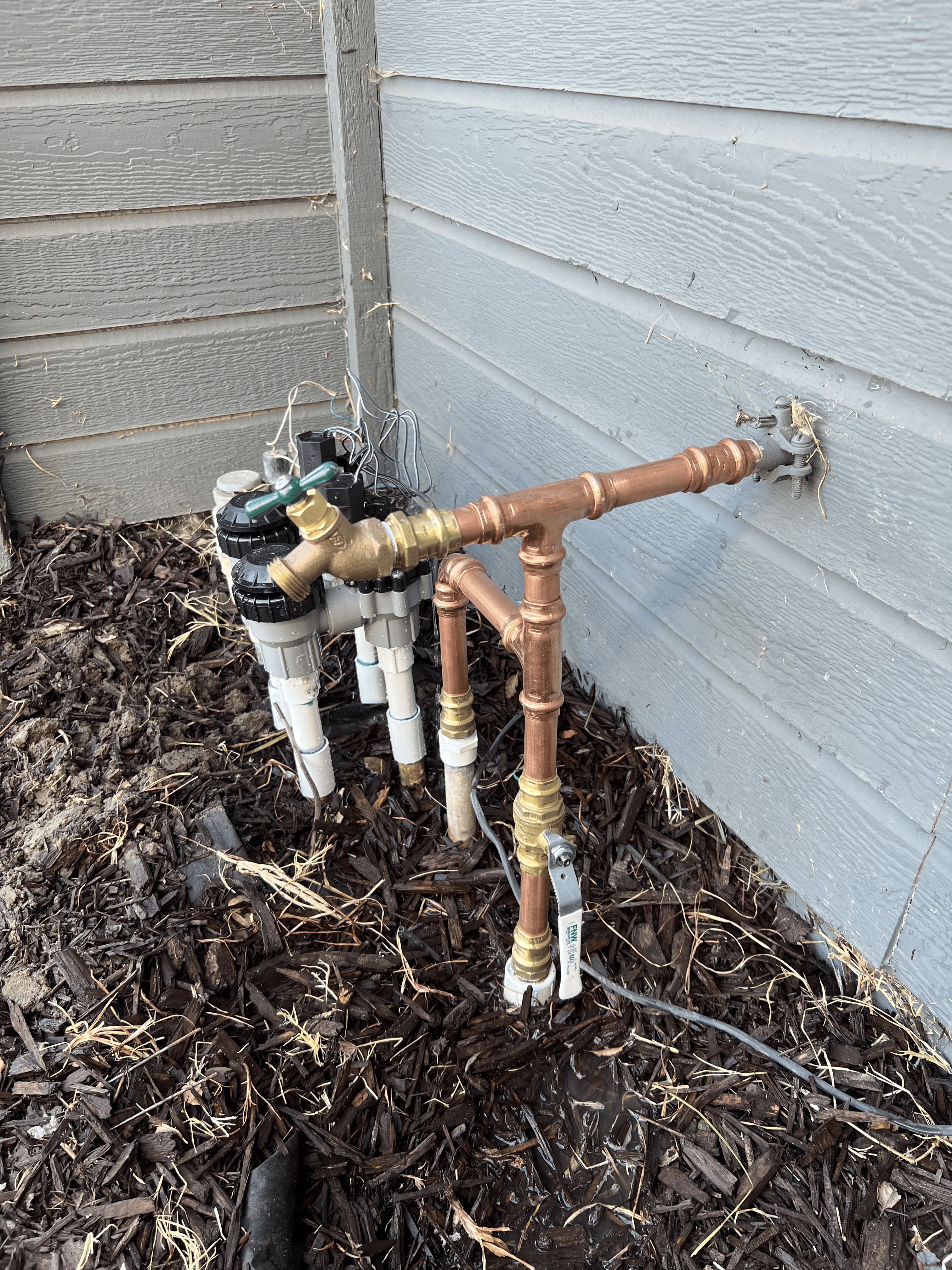 Technician working on pipes