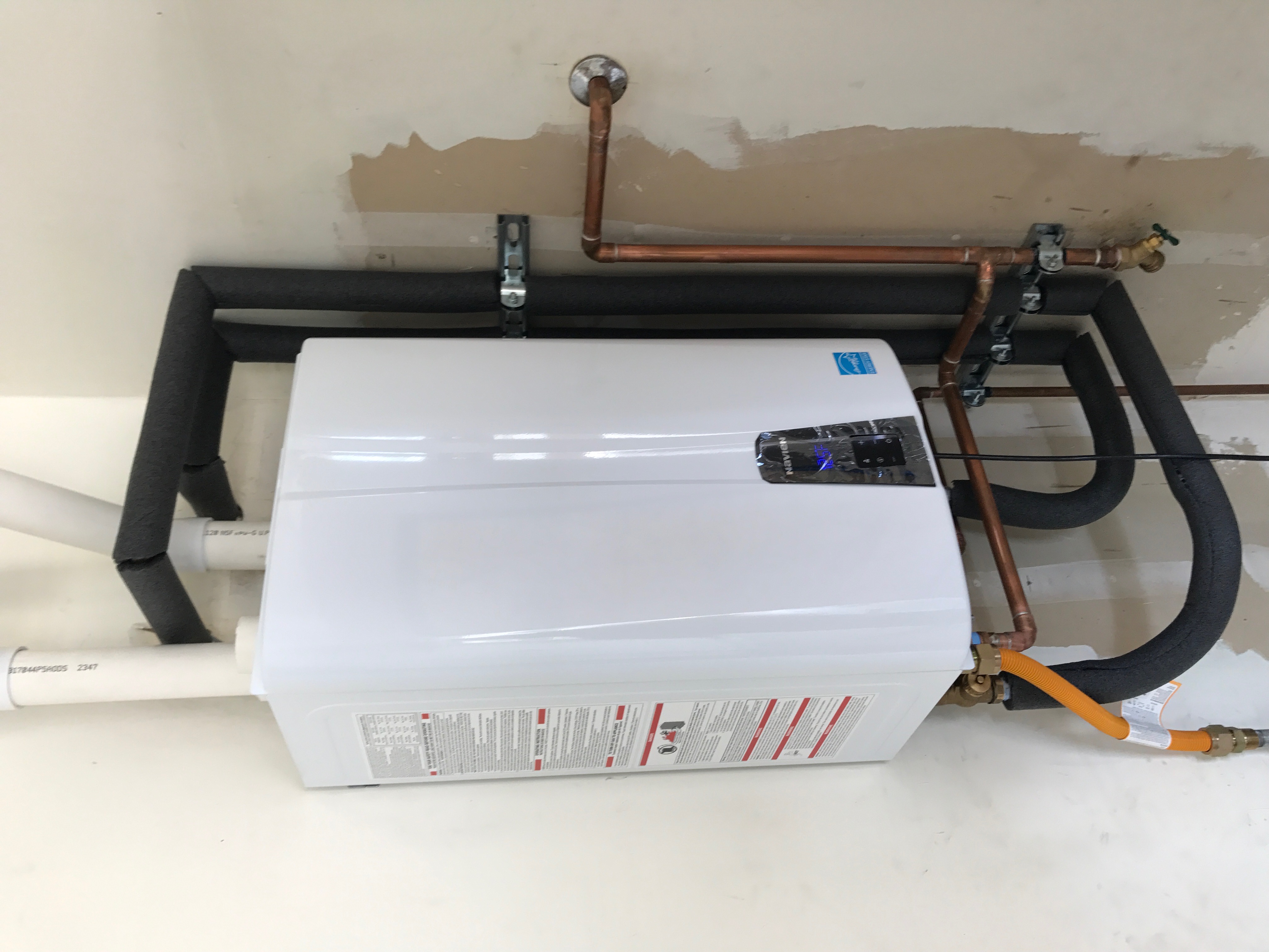 Plumber examining equipment